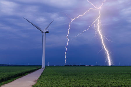 Figure 1. Representative lightning strike near a wind turbine in an onshore wind farm (source Shutterstock) Arctura fig 1