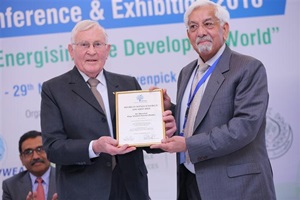 WWEA President Peter Rae presented the award certificate to Shahid Hamid. (source World Wind Energy Association) World Wind Energy Award Shahid Hamid