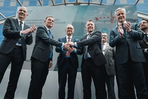 From left to right: Roland Lescure, Minister Delegate in charge of Industry and Energy, Laurent Castaing, Managing Director of Chantiers de l'Atlantique, Xavier Piechaczyk, Chairman of the Management Board of RTE, Niklas Persson, Managing Director of Hitachi Energy's Grid Integration business, and Bruno le Maire, Minister of the Economy, Finance and Industrial and Digital Sovereignty. In the back from left, Armand Pineda, Head of Marketing & Sales of Hitachi Energy's Grid Integration business and Thomas Veyrenc, Managing Director of the Finance, Purchasing and Risks Division of RTE (Photo credits: Chantiers de l’Atlantique) RTE CdA Hitachi Energy Agreement Saint Nazaire 2